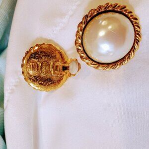 Elegant vintage gold tone Carolee clip on earrings.